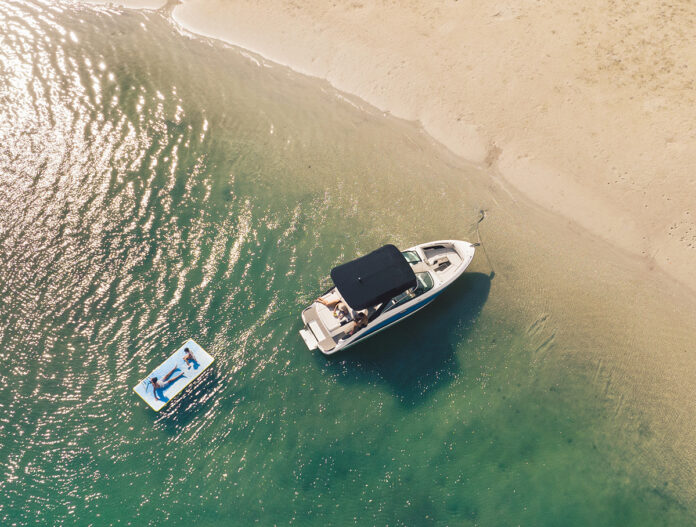 Aerial view of an SLX 260 at a secluded beach