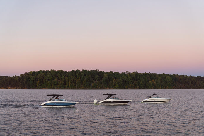 SLX 260, SLX 260 Outboard and SLX 260 Surf at twilight